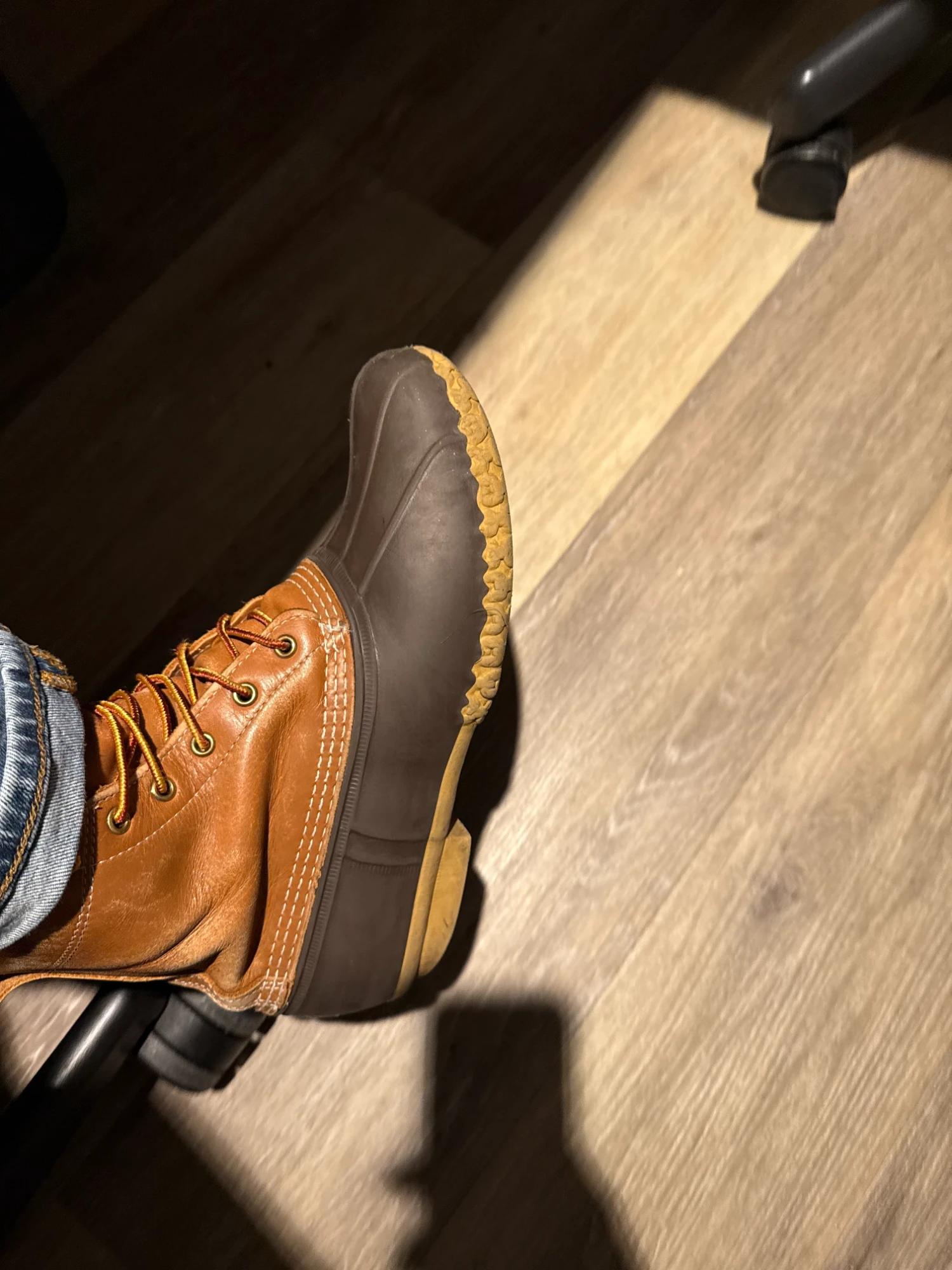 Duck boot on the office floor